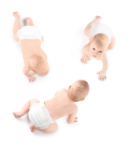 Set of cute little baby crawling on white background, top view — Stock Photo, Image