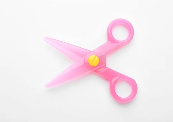 Colorful plastic scissors on white background. School stationery — Stock Photo, Image