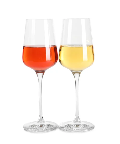 Vasos de diferentes vinos deliciosos y caros sobre fondo blanco — Foto de Stock
