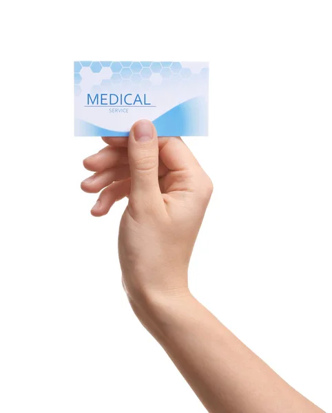 Mulher segurando cartão de visita isolado em branco, close-up. Serviço médico — Fotografia de Stock