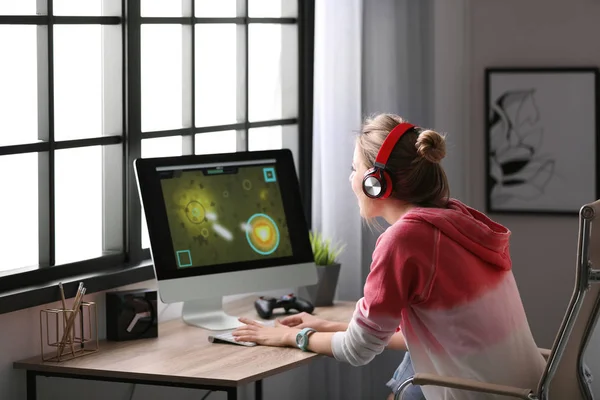 Young Girl Playing Game Computer Online In Internet Cafe Stock Photo,  Picture and Royalty Free Image. Image 101617114.