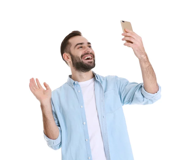 Homem usando telefone celular para bate-papo de vídeo isolado no branco — Fotografia de Stock