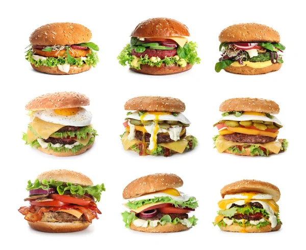 Set van heerlijke hamburgers op witte achtergrond — Stockfoto
