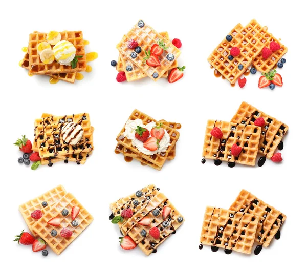 Set of delicious waffles with different toppings on white background, top view — Stock Photo, Image