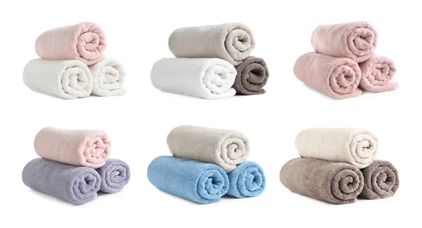 Conjunto de diferentes toallas de rizo limpias sobre fondo blanco — Foto de Stock