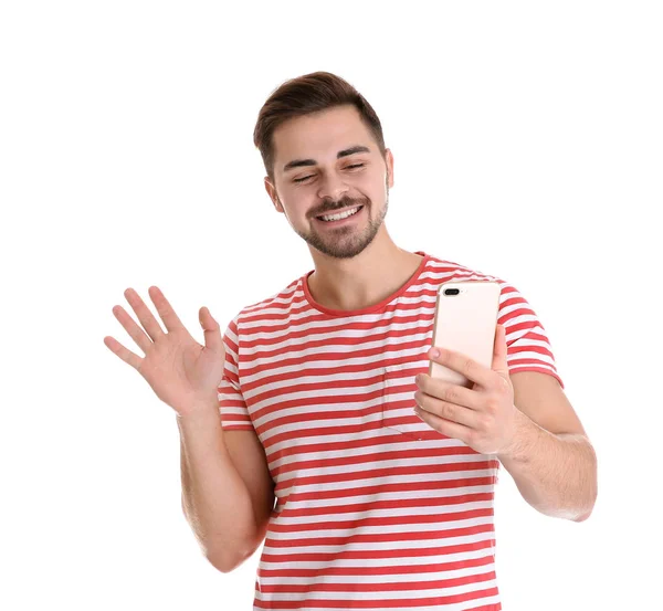 Hombre usando el teléfono móvil para el chat de vídeo aislado en blanco — Foto de Stock