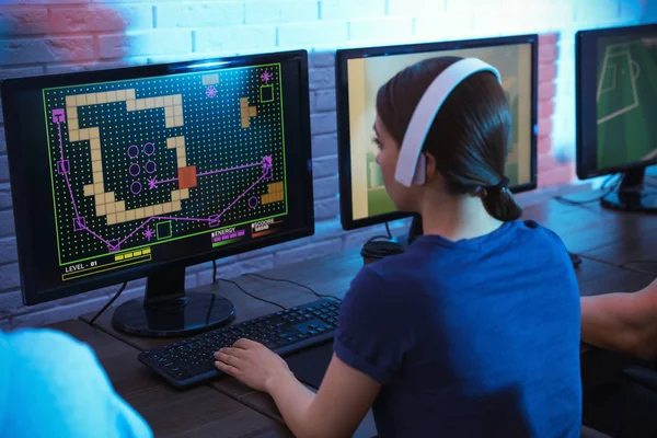 Young Girl Playing Game Computer Online In Internet Cafe Stock Photo,  Picture and Royalty Free Image. Image 101617114.