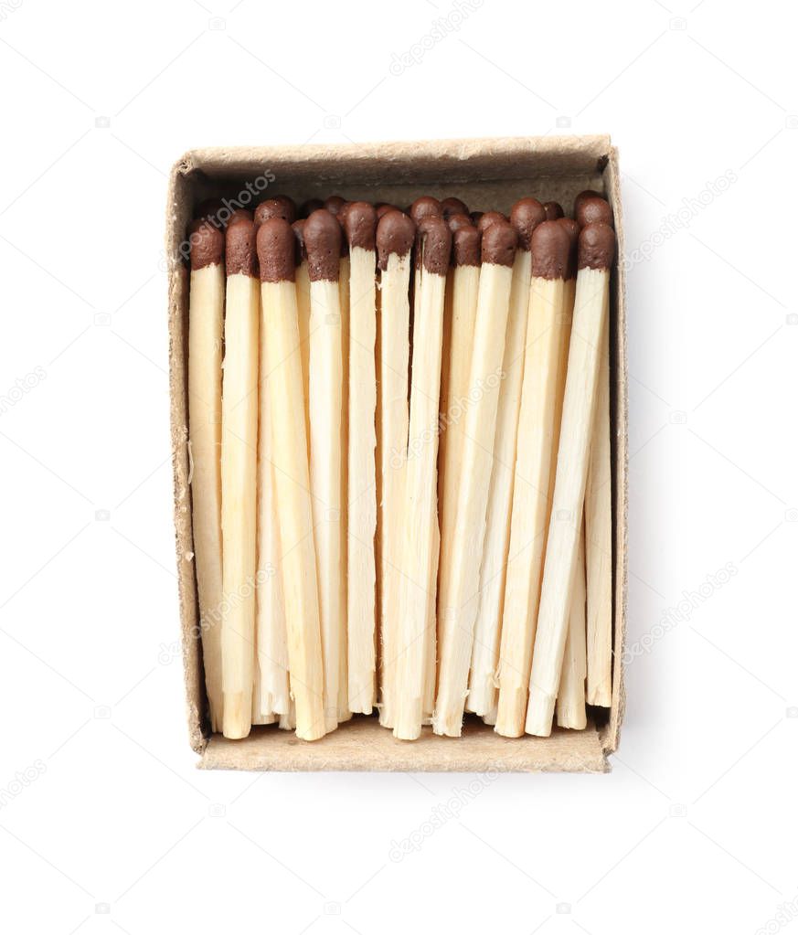Cardboard box with matches on white background, top view