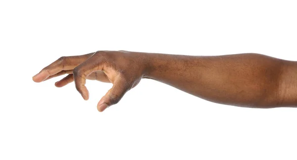 Hombre afroamericano sosteniendo algo en la mano sobre fondo blanco, primer plano —  Fotos de Stock