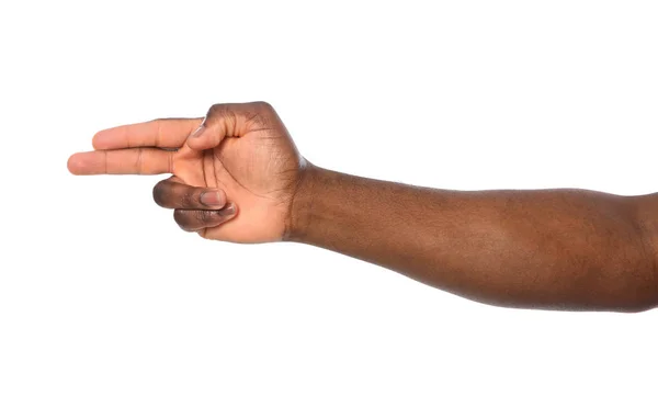 Afrikanisch-amerikanischer Mann zeigt Shooting-Geste auf weißem Hintergrund, Nahaufnahme — Stockfoto