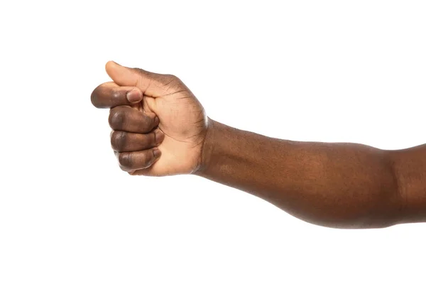 African-American mężczyzna trzyma coś w ręku na białym tle, zbliżenie — Zdjęcie stockowe