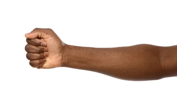 Hombre afroamericano mostrando puño sobre fondo blanco, primer plano —  Fotos de Stock