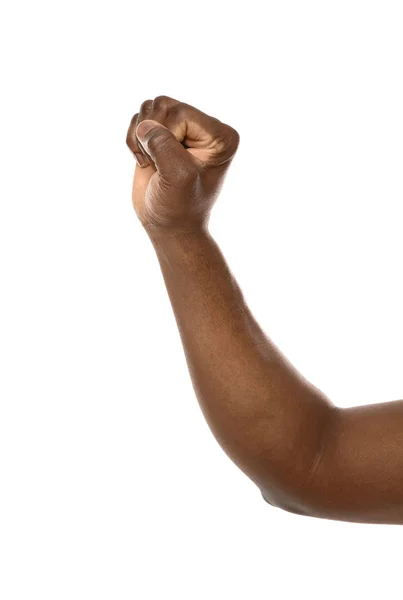 Hombre afroamericano mostrando puño sobre fondo blanco, primer plano — Foto de Stock