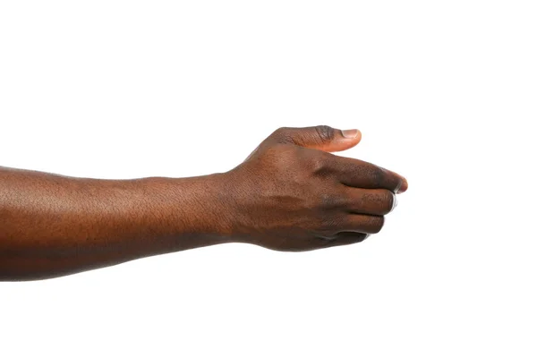 Uomo afro-americano che tende la mano per stringere su sfondo bianco, primo piano — Foto Stock