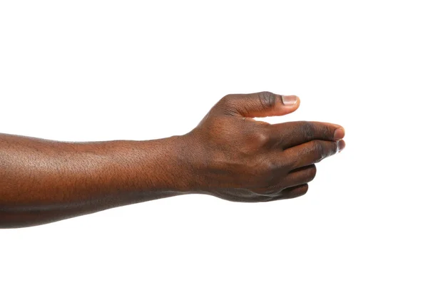 Hombre afroamericano extendiendo la mano para agitar sobre fondo blanco, primer plano — Foto de Stock