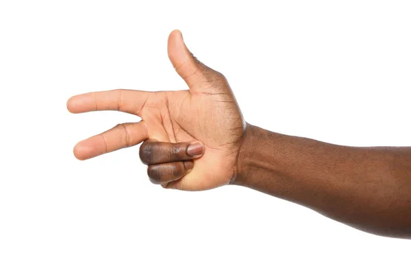 Afrikanisch-amerikanischer Mann zeigt Nummer zwei auf weißem Hintergrund, Nahaufnahme — Stockfoto