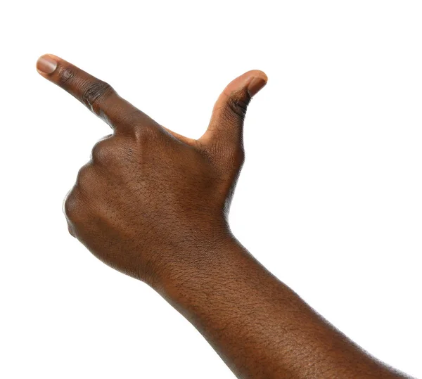 African-American man pointing at something on white background, closeup — Stock Photo, Image