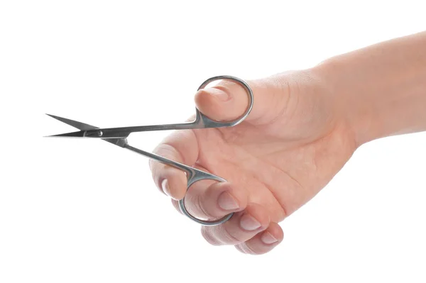 Woman holding nail scissors on white background, closeup — Stock Photo, Image