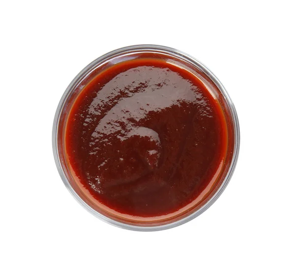 Glass bowl of barbecue sauce on white background, top view — Stock Photo, Image