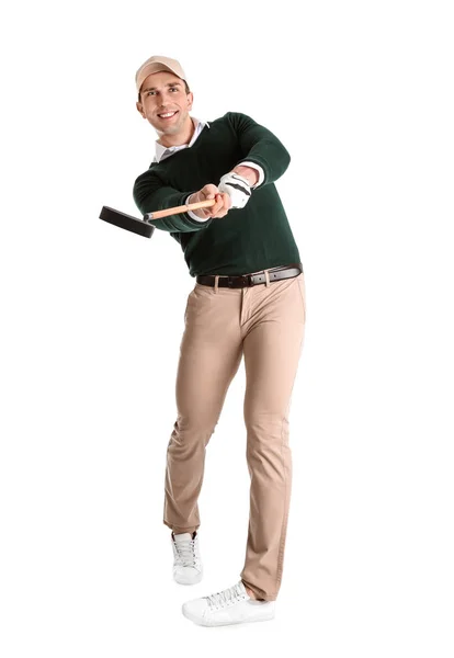 Joven jugando al golf sobre fondo blanco — Foto de Stock