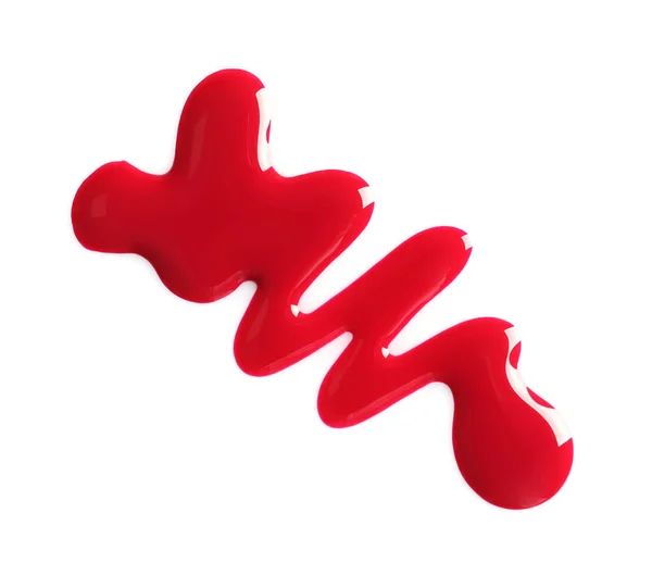 Spilled bright nail polish on white background, top view — Stock Photo, Image