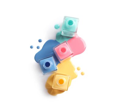 Spilled different nail polishes with bottles on white background, top view clipart