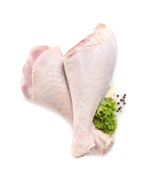 Raw turkey drumsticks and ingredients on white background, top view — Stock Photo, Image