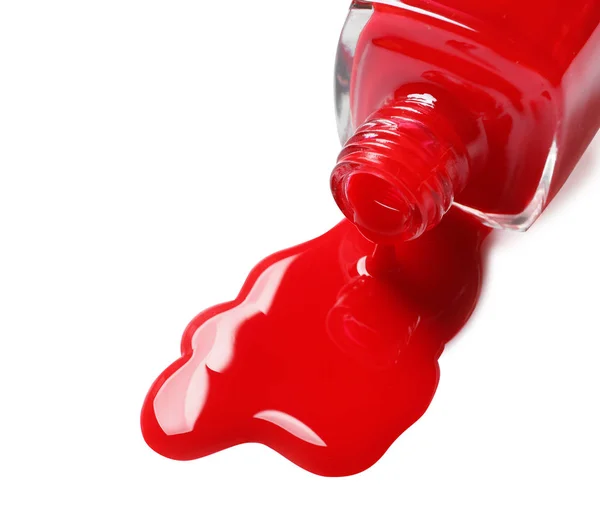 Spilled color nail polish with bottle on white background — Stock Photo, Image