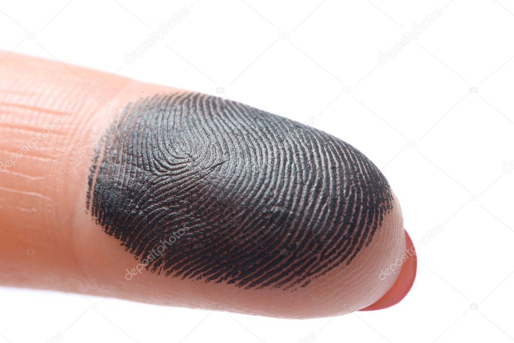 Closeup view of human finger covered with black ink on white background