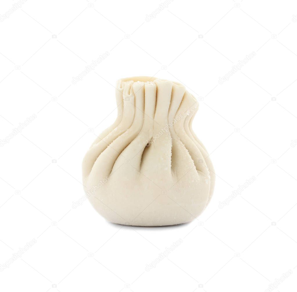 Raw dumpling with tasty filling on white background