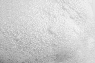 Arka plan olarak yumuşak beyaz sabun köpük, closeup