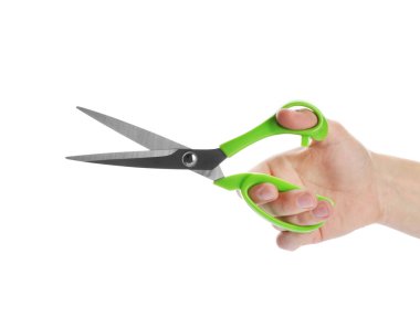 Beyaz, closeup izole dikiş makası çifti tutan adam