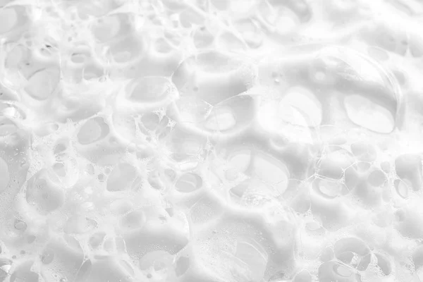 背景として柔らかい白い石鹸の泡、クローズアップ — ストック写真