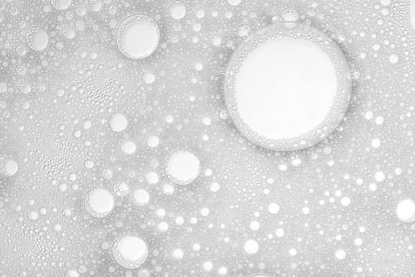 背景として柔らかい白い石鹸の泡、クローズアップ — ストック写真