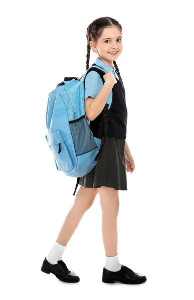 Full längd porträtt av söt flicka i skoluniform med ryggsäck på vit bakgrund — Stockfoto