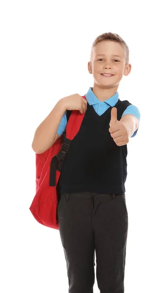 Retrato de niño lindo en uniforme escolar con mochila sobre fondo blanco — Foto de Stock