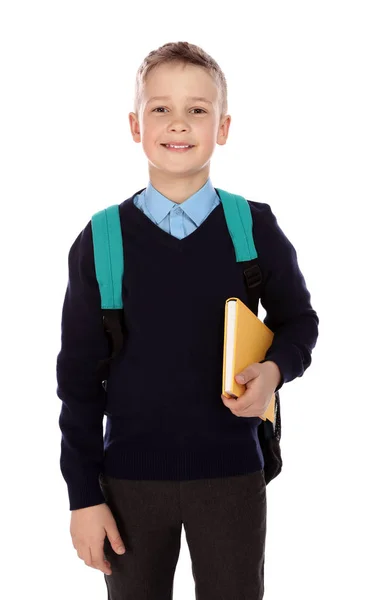 Retrato de niño lindo en uniforme escolar sobre fondo blanco —  Fotos de Stock