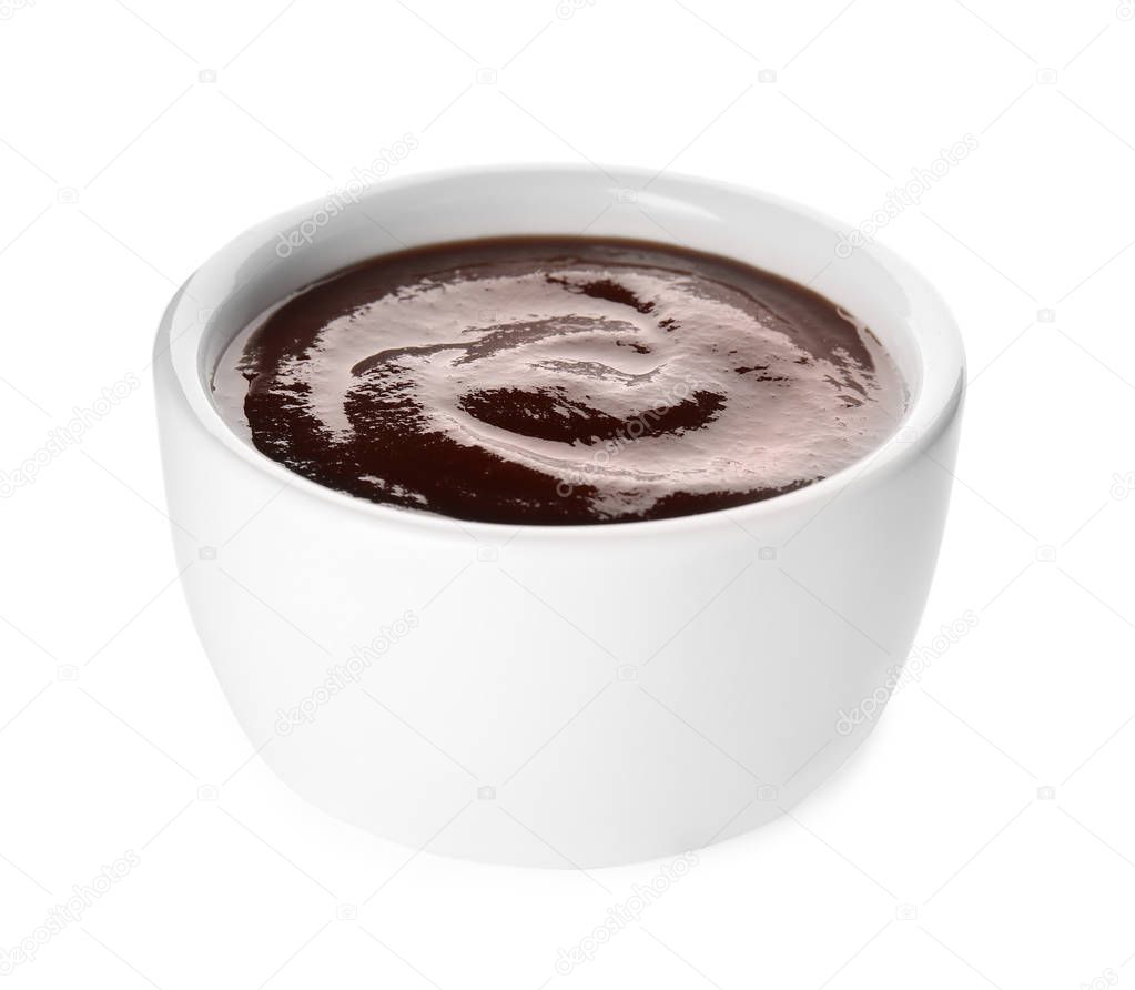 Bowl of barbecue sauce on white background