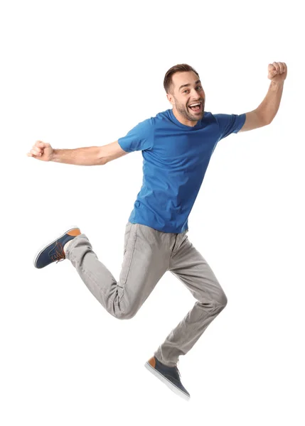 Volledige lengte portret van gelukkig knap man springen op witte achtergrond — Stockfoto