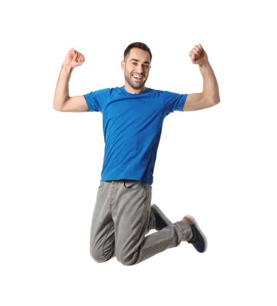 Ritratto a figura intera di uomo bello felice che salta su sfondo bianco — Foto Stock