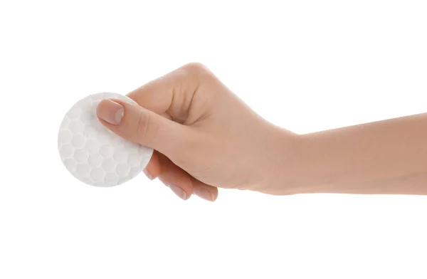 Woman holding cotton pad on white background, closeup — Stock Photo, Image