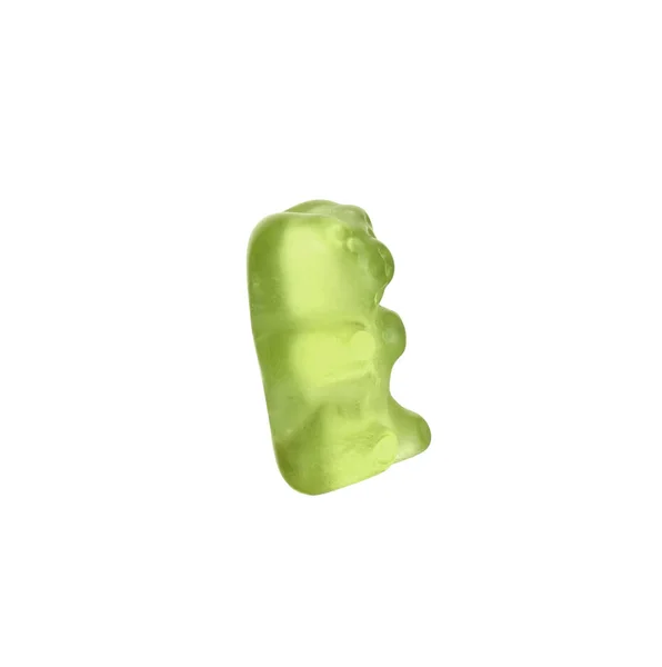 Вкусный зеленый медведь желе на белом фоне — стоковое фото