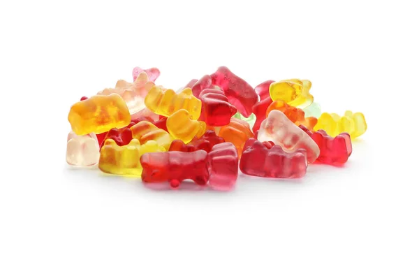 Haufen leckerer Gummibärchen auf weißem Hintergrund — Stockfoto