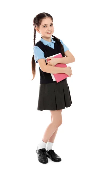 Retrato de longitud completa de linda chica en uniforme escolar con libros sobre fondo blanco —  Fotos de Stock