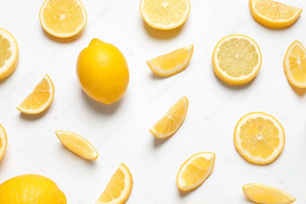 Fresh lemons on white background, top view. Citrus fruits