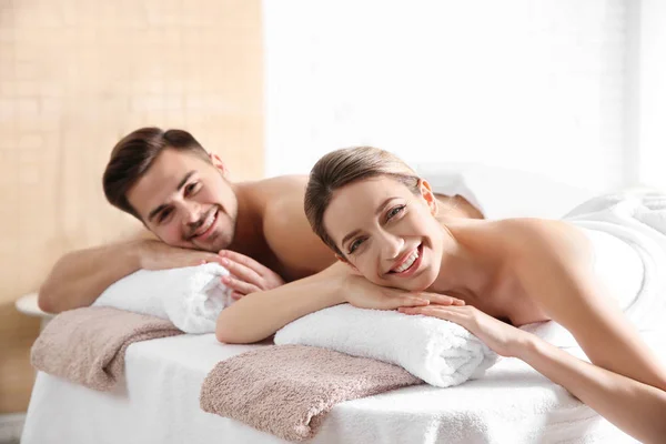 Romantic young couple relaxing in spa salon — Stock Photo, Image