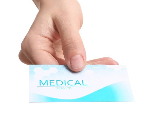 Woman holding business card isolated on white, closeup. Medical service — Stock Photo, Image