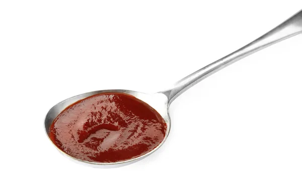 Colher com molho de churrasco quente no fundo branco — Fotografia de Stock