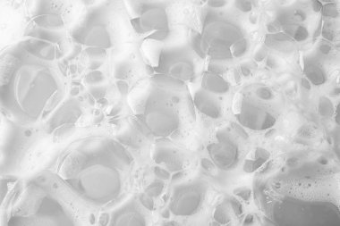 Arka plan olarak yumuşak beyaz sabun köpük, closeup