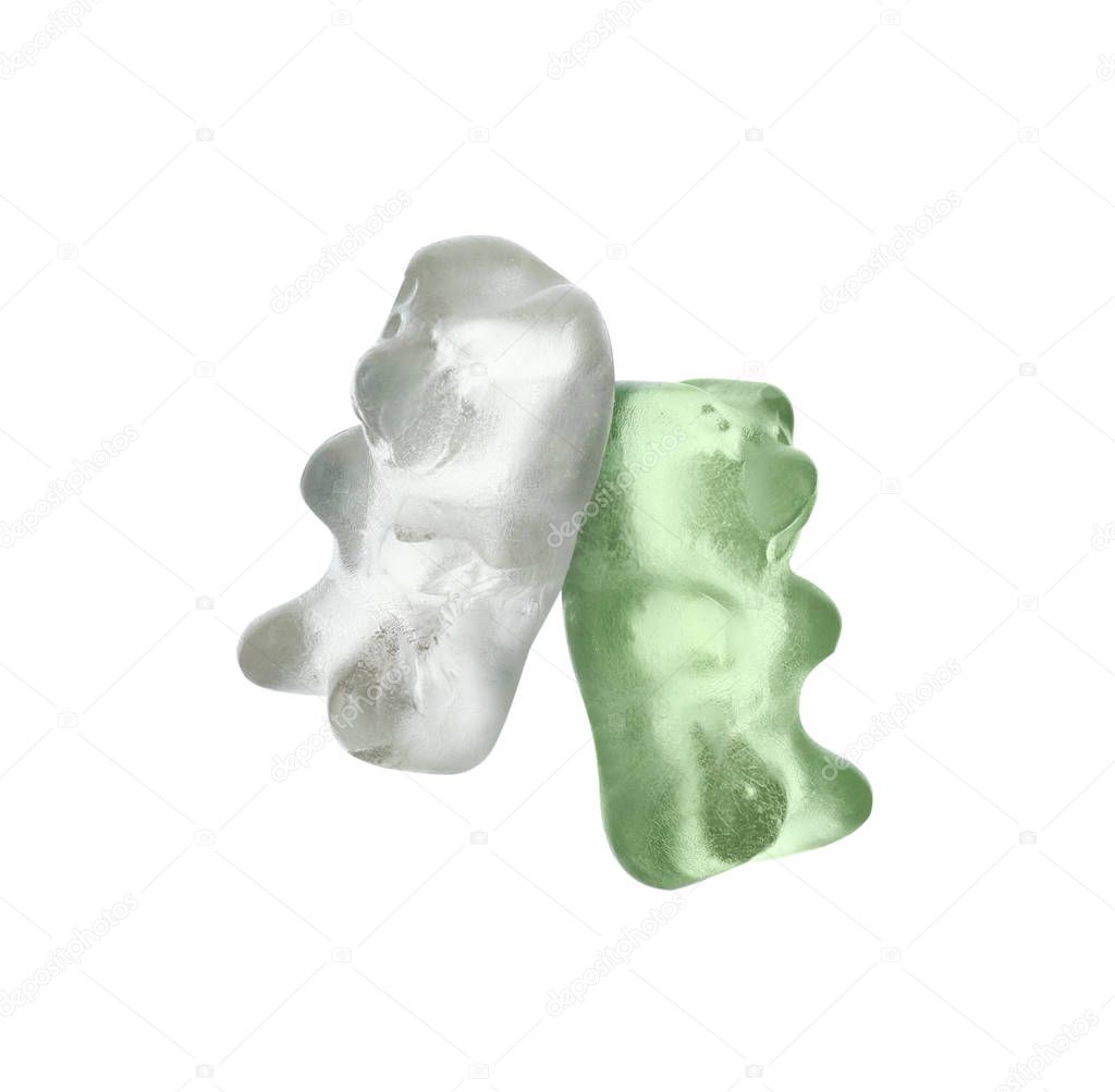 Delicious colorful jelly bears on white background